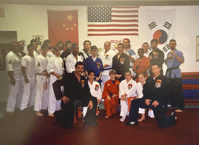 With GM Vic LeRoux in Tampa, Fl. 1997; I`m the guy in black behind the kid in red