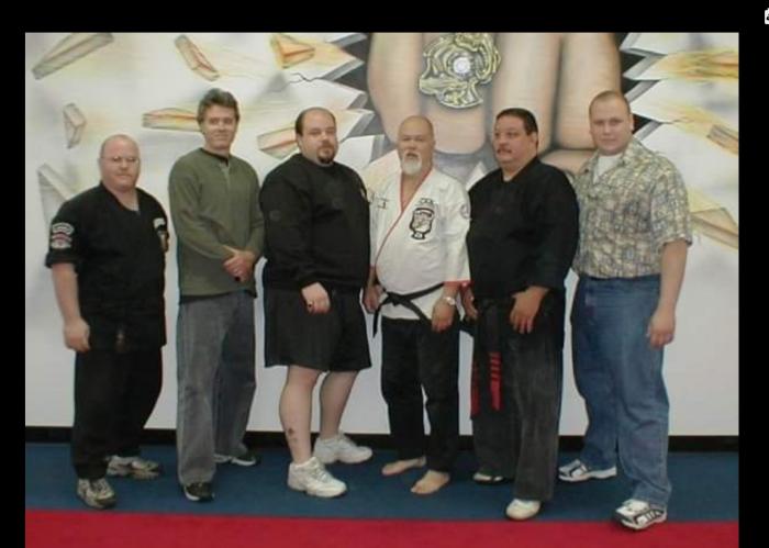 Zach whitson, Mr.Planas, Max, Mr. Trejo and I at Mike Cappi's school